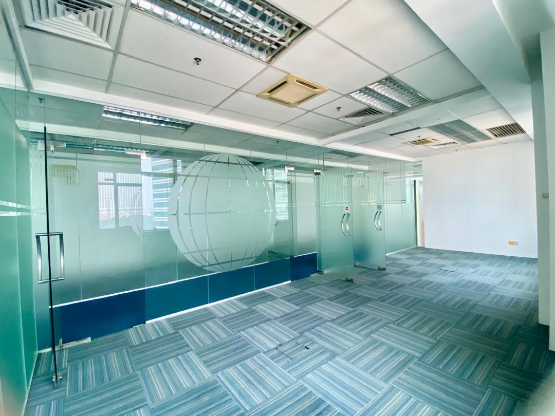 Glass-partitioned room with carpeted flooring in a 2,279 sq ft fitted Plaza Sentral office for rent in KL Sentral.