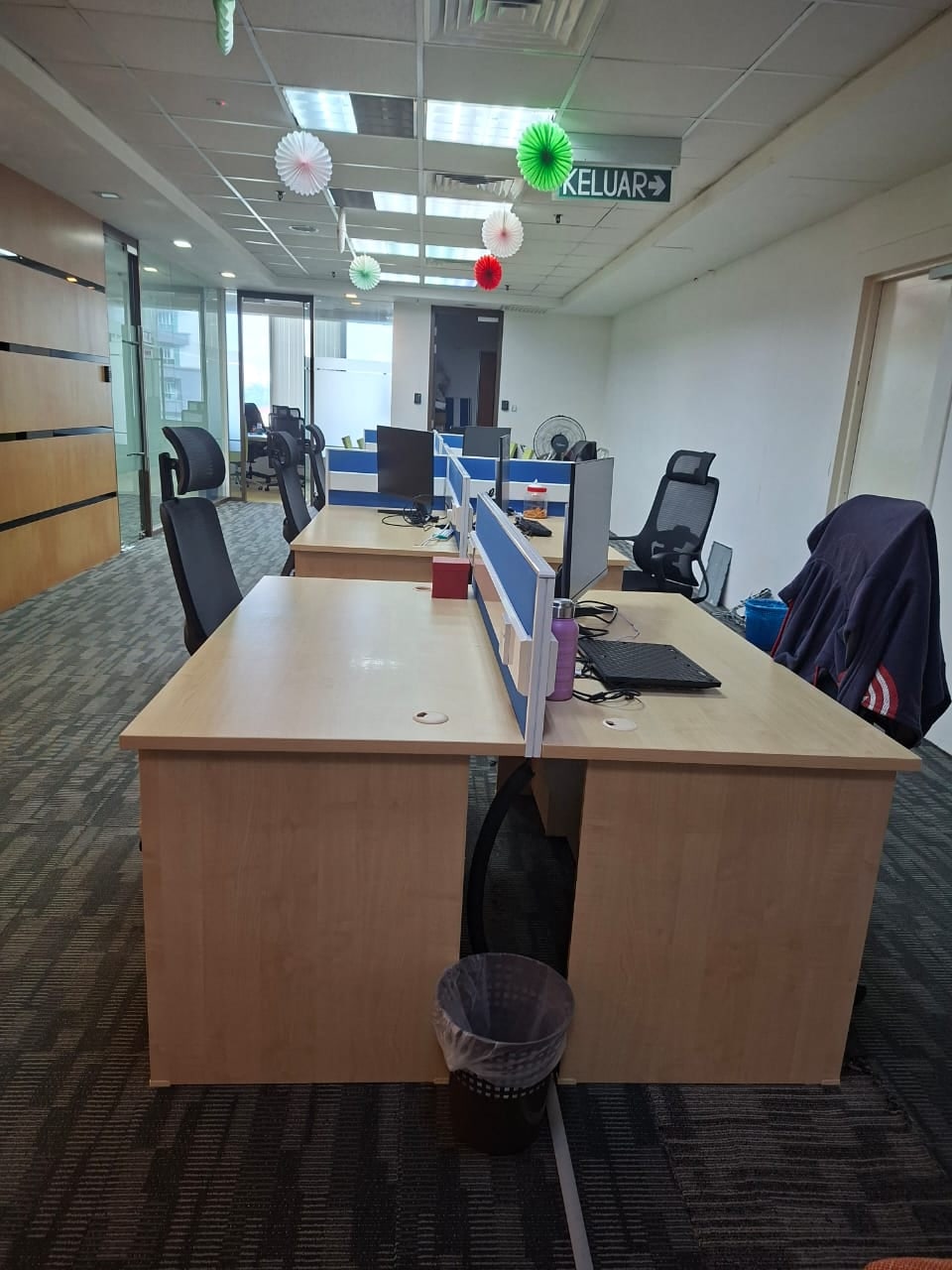 Open-plan desks and glass-partitioned rooms in Plaza Sentral office for rent, KL Sentral