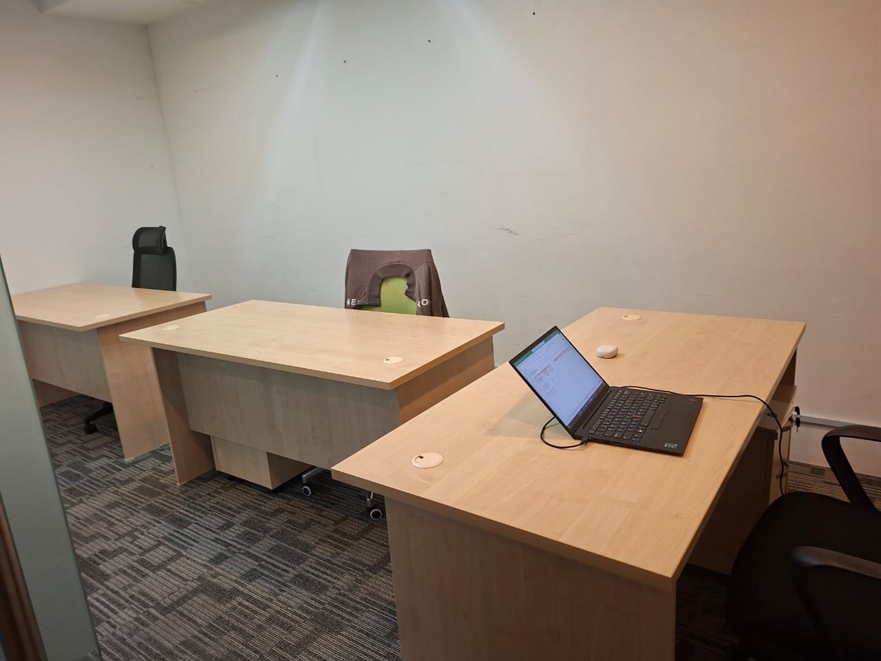 Partitioned office room with timber desks at Plaza Sentral for rent in KL Sentral